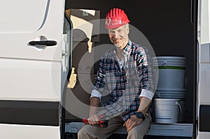 Craftsman sitting on van