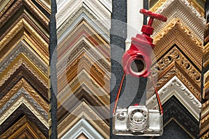 Craftsman working on frame in frameshop.