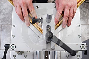 Craftsman working on frame in frameshop.