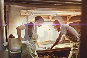 Craftsmen leaning sketching on table