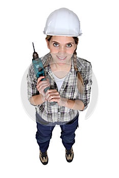 Craftswoman holding a drill