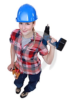 Craftswoman holding a drill