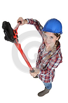 Craftswoman holding a spanner