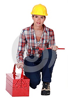 Craftswoman holding a spanner