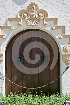 Crafty wooden door with small windows