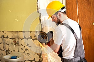 Crafty worker cutting metal fittings