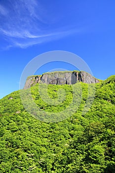 Crag mountain with fresh verdure