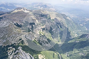 Crags of Cambio peak facing  Antrodoco, aerial, Italy photo