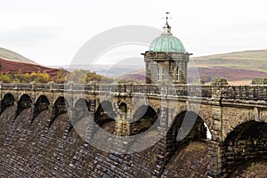 The Craig Goch reservoir and dam intake tower. photo