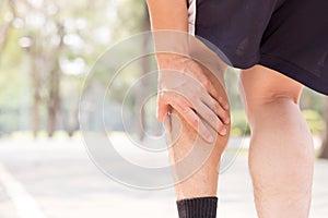 Cramp in leg while exercising. Sports injury concept