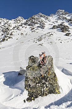 Crampons on a boulder