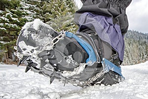 Crampons on hiking boot