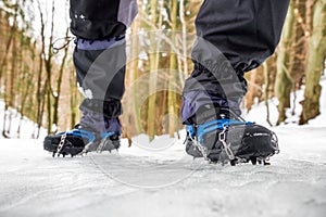 Crampons on hiking boot.Hiking in winter