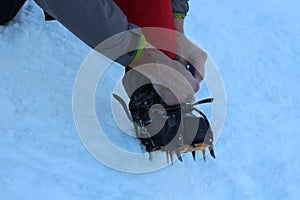 Crampons on trekking shoes in High Tatras