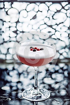 Cranberry cocktail in a cocktail glass