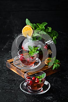 Cranberry and mint tea. Hot winter drinks.
