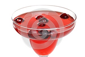 Cranberry punch cocktail focus on front rim glass
