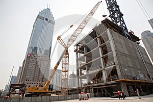 Crane and big building under construction