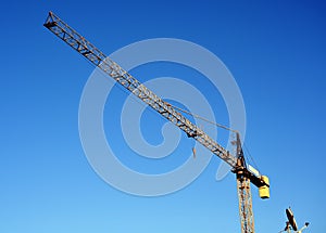 Crane on blue sky