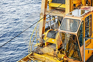 Crane boom structure and metal sling on blue sky background