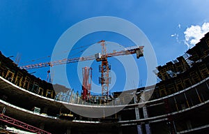 Crane and building construction site