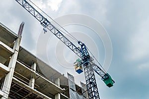 Crane with building construction site