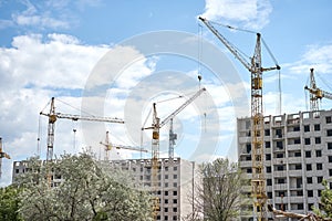 Crane building construction site blue cloudy sky background