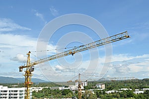 Crane and building working progress, construction site