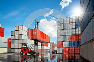 Crane car move and carry container box from container stack loading to truck in container box deposit conpany