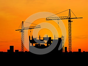 Crane construction at dramatic sky background