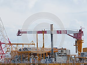Crane construction on Oil and Rig platform for support heavy cargo.