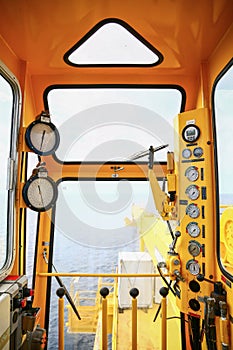 Crane construction on Oil and Rig platform for support heavy cargo, Transfer cargo or basket on work site, Heavy industry