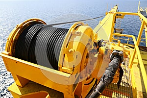 Crane construction on Oil and Rig platform for support heavy cargo, Transfer cargo or basket on work site, Heavy industry