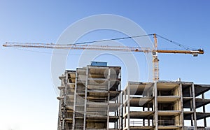 Crane construction site blue sky