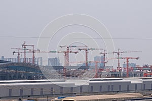 Crane construction site. Construction of transportation in train industrial with cranes