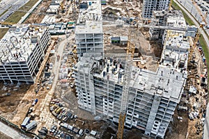 Crane at construction site near residential complex. aerial photo