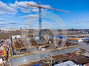 Crane on construction site in outskirts