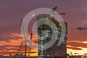 Construction site under sunset