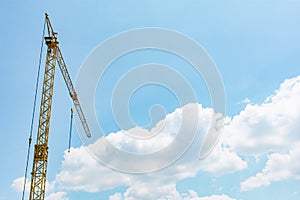 Crane,Construction Tower Crane Against Blue Sky.