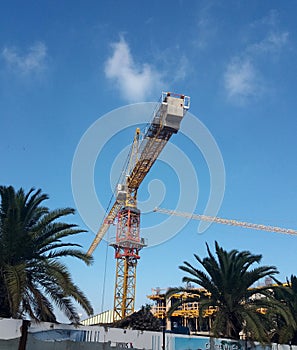 A crane in a construction work - Tall scaffold structure from below- Image