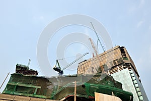 Crane on destruction building