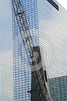 Crane for dutch modern blue glass wall, Rotterdam
