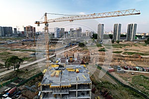 Crane during formworks on construction site. Pouring concrete into formwork. Construction the buildings and multi-storey