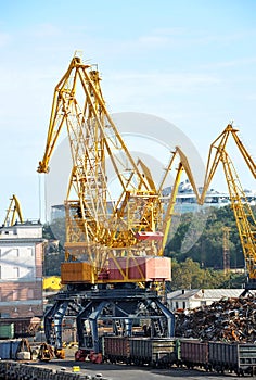 Crane, freight train and scrap metal