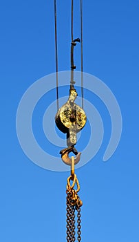Crane hanging hooks and chains.