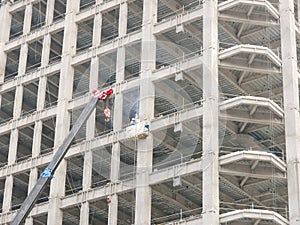 Crane and high building