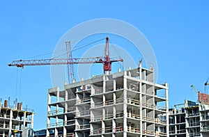 Crane and highrise construction site