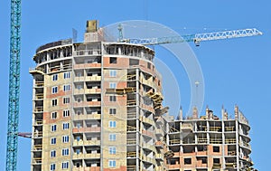 Crane and highrise construction site