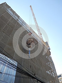 Crane hoisted cement bucket