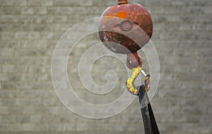 Crane hook ball gray background